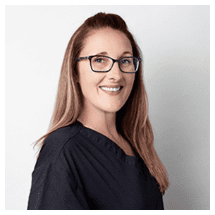 Fabiana DiGregorio, Registered Dental Hygienist who works at both Dental Studio locations, wearing professional scrubs