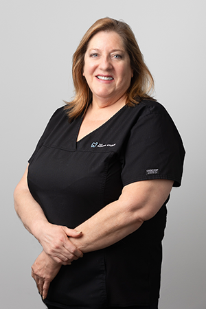 Dr. Karen Kulikowski, DMD - Former Army Reserve Sergeant and Summit dentist specializing in teeth bonding procedures